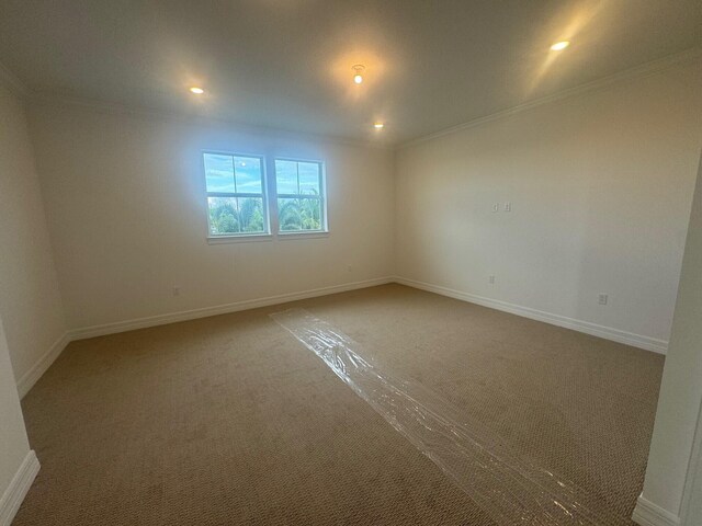 carpeted bedroom featuring a textured ceiling and ornamental molding