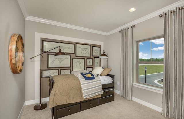 bedroom with ornamental molding, light colored carpet, and baseboards