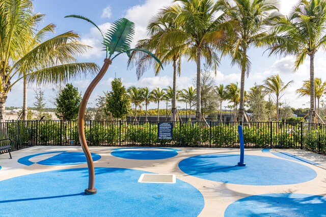 view of swimming pool featuring an in ground hot tub and a patio area