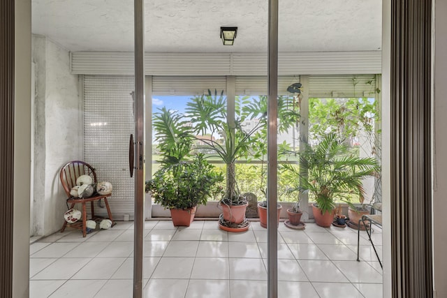 unfurnished sunroom featuring a healthy amount of sunlight