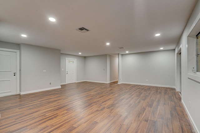 interior space with dark hardwood / wood-style floors