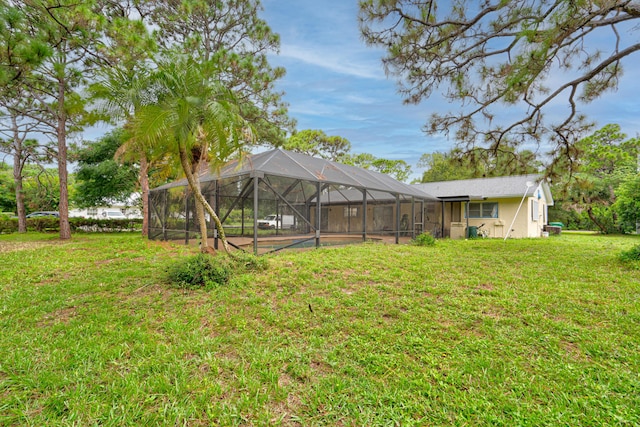 view of yard with a lanai