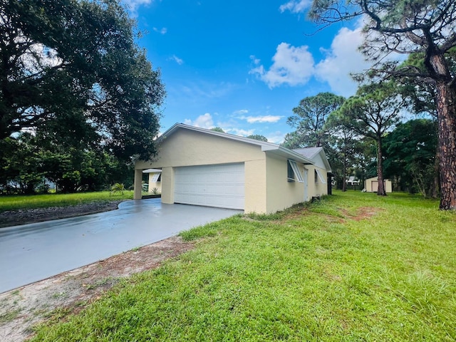 view of property exterior with a garage and a lawn