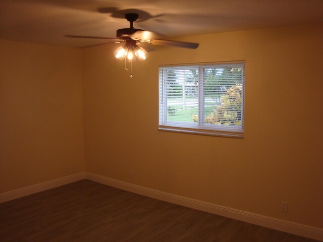 unfurnished room featuring ceiling fan and wood-type flooring