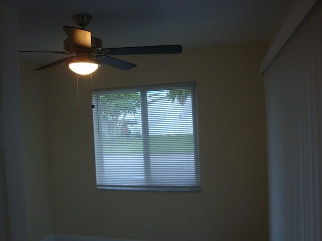 spare room featuring ceiling fan