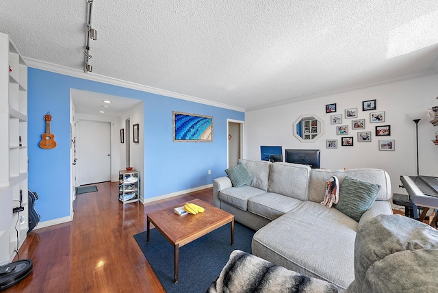 living room featuring ornamental molding, a textured ceiling, and dark wood-type flooring