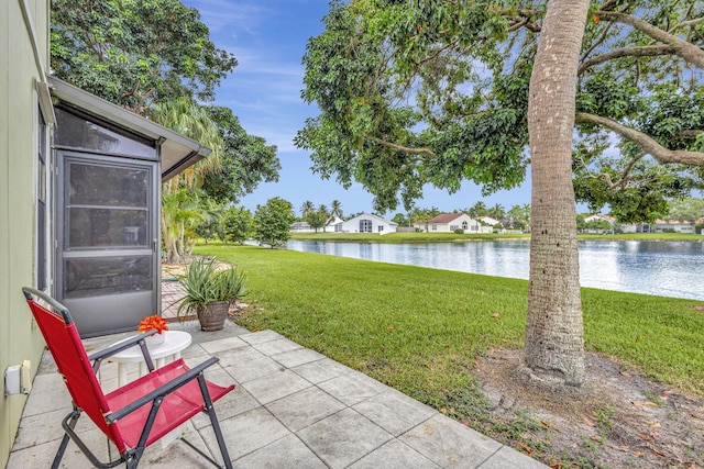 view of patio featuring a water view