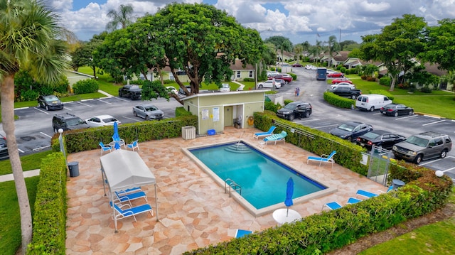 view of pool featuring a patio area