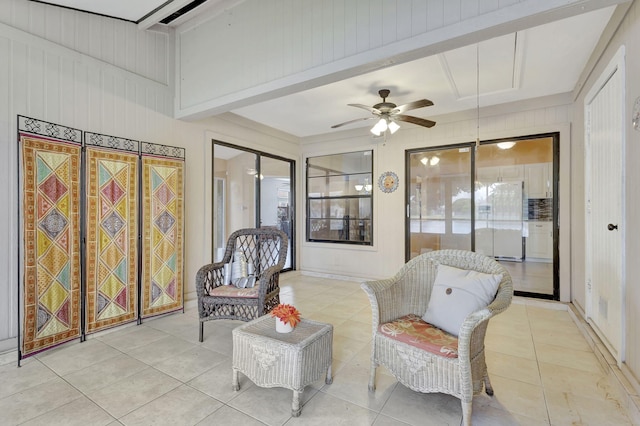 interior space featuring ceiling fan and light tile patterned floors