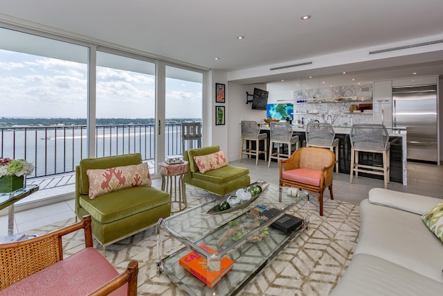 living room featuring expansive windows