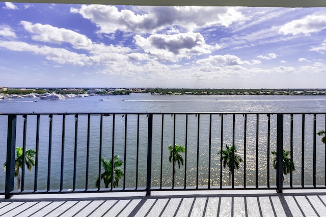 balcony featuring a water view