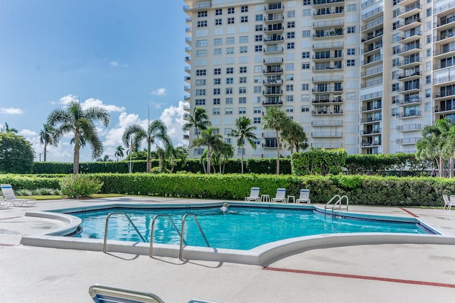 pool with a patio area