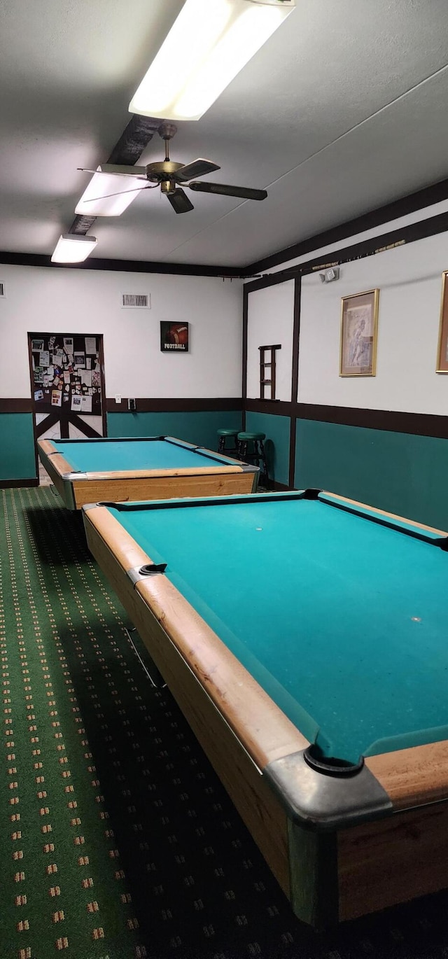 game room featuring ceiling fan, pool table, and dark colored carpet