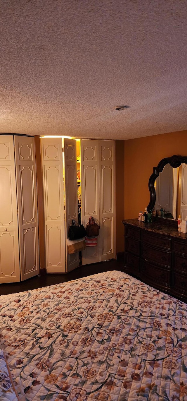 bedroom featuring a textured ceiling