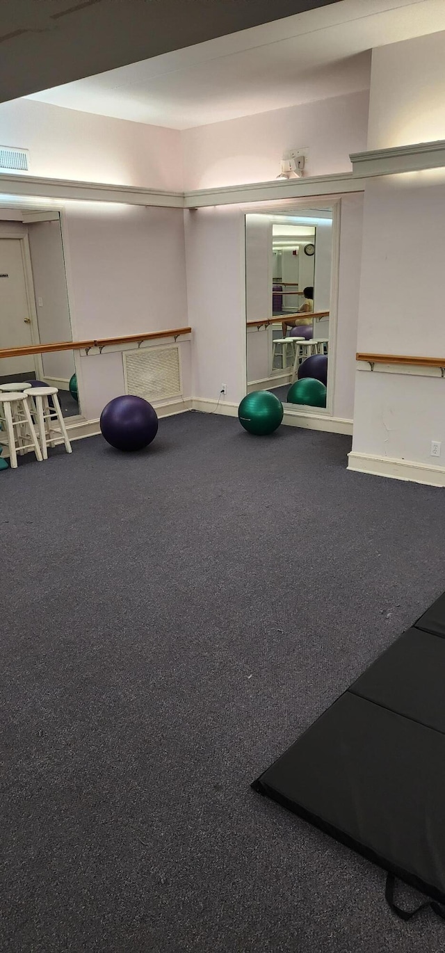 exercise area with carpet flooring