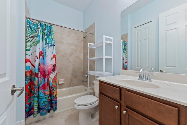 full bathroom with tile patterned flooring, toilet, shower / bath combo with shower curtain, and vanity