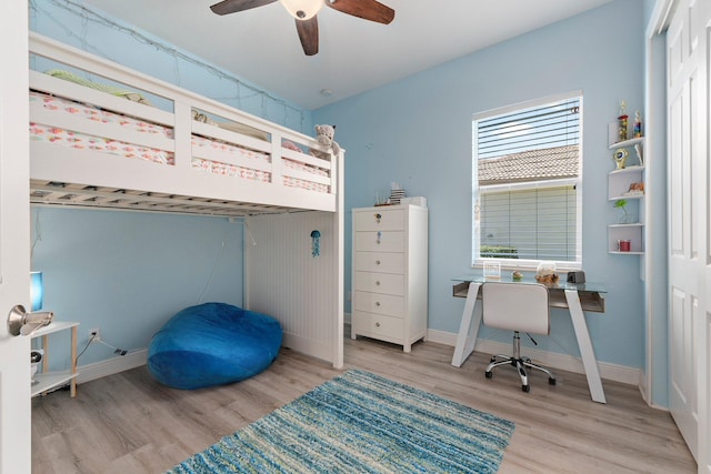 bedroom featuring ceiling fan and light wood-type flooring