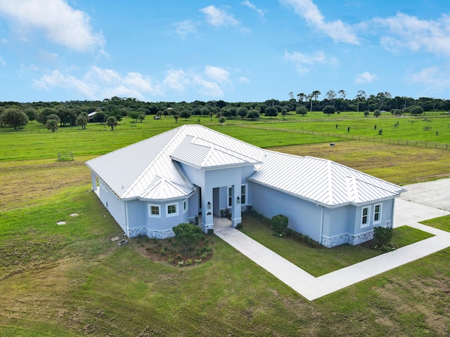 birds eye view of property featuring a rural view