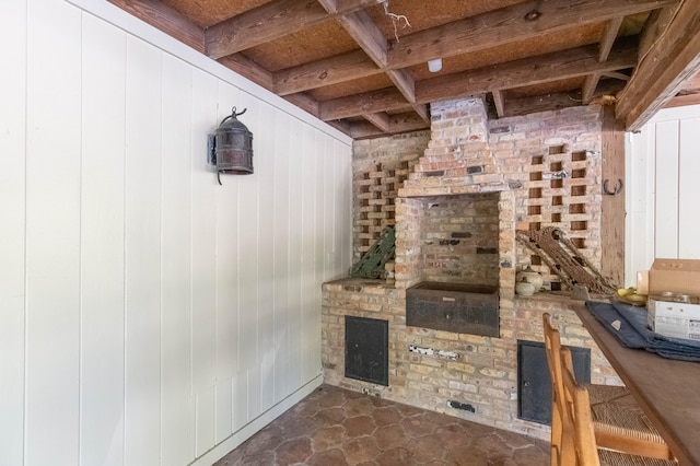 wine area featuring wood walls