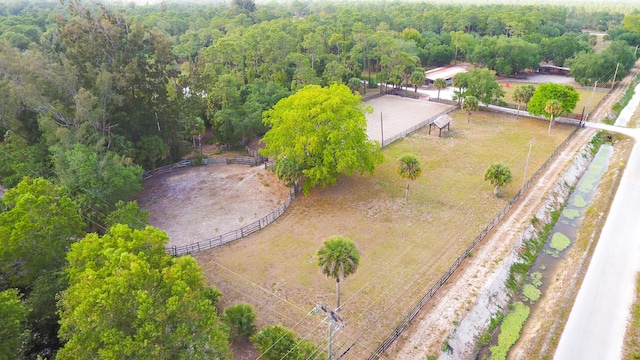 birds eye view of property with a rural view