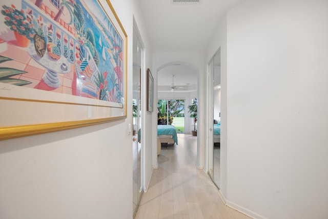 hallway featuring light wood-type flooring