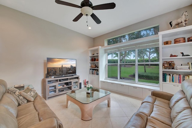 tiled living room featuring ceiling fan