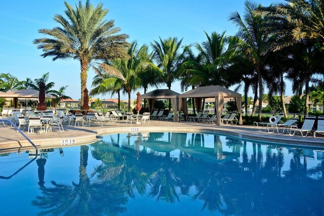 view of swimming pool featuring a gazebo