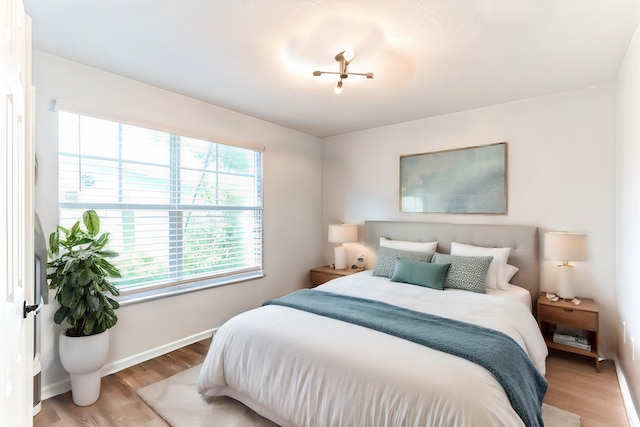 bedroom featuring light hardwood / wood-style floors