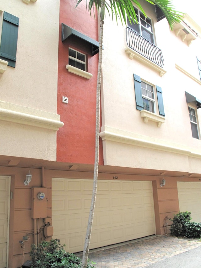 view of building exterior featuring a garage