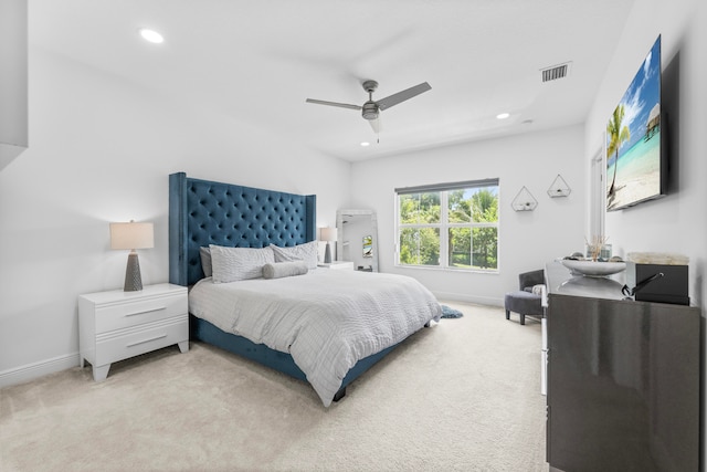 carpeted bedroom with ceiling fan