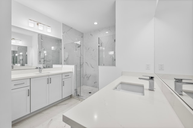 bathroom with tile patterned flooring, vanity, and an enclosed shower