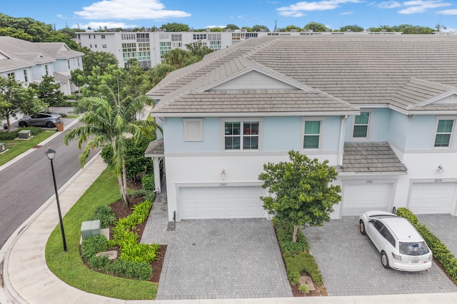 view of front of property with a garage