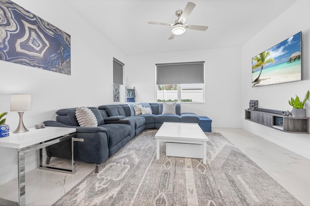 living room with ceiling fan and light tile patterned floors