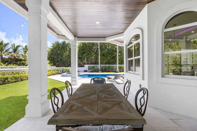 view of patio / terrace featuring an outdoor pool