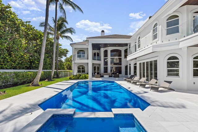 view of swimming pool with a patio area