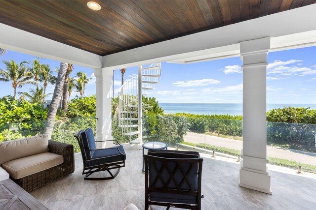 view of patio featuring a water view