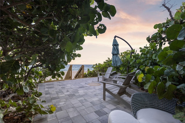 view of patio terrace at dusk