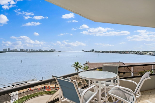 balcony featuring a water view