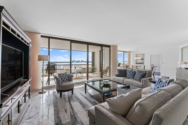 100 Lakeshore Dr Unit 457, North Palm Beach, FL 33408 - living room with light marble finish flooring, a water view, and floor to ceiling windows