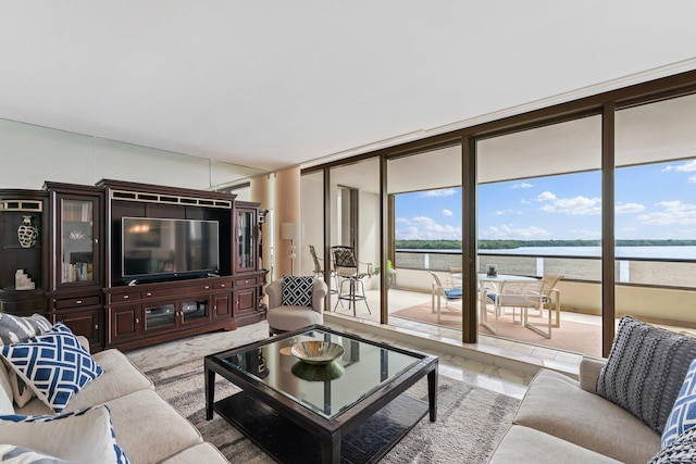 100 Lakeshore Dr Unit 457, North Palm Beach, FL 33408 - living area with a water view and expansive windows