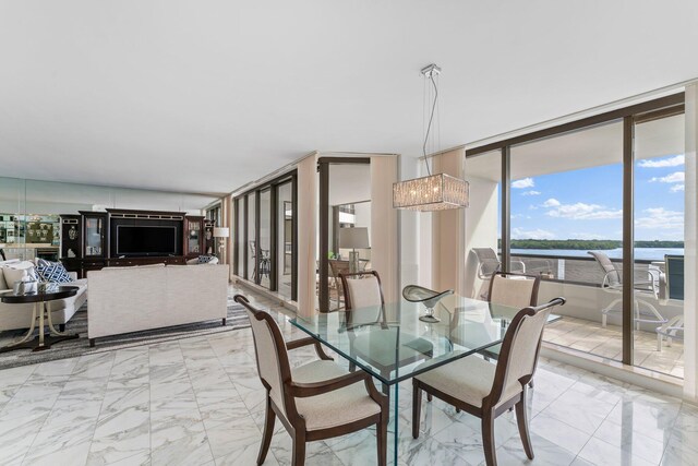 bedroom featuring floor to ceiling windows, ceiling fan, access to exterior, and crown molding