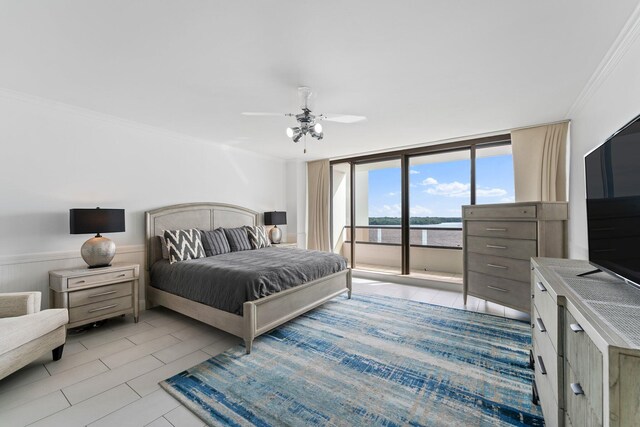 bedroom featuring expansive windows, ceiling fan, ornamental molding, and access to outside