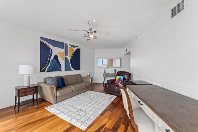 100 Lakeshore Dr Unit 457, North Palm Beach, FL 33408 - living area featuring wood finished floors, a ceiling fan, crown molding, an office area, and wainscoting