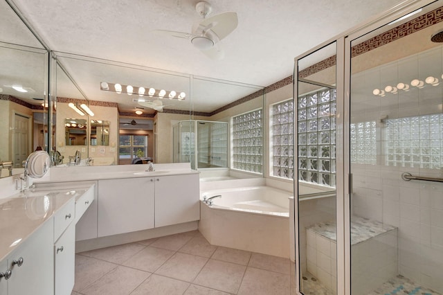 bathroom featuring vanity, ceiling fan, independent shower and bath, and tile patterned flooring