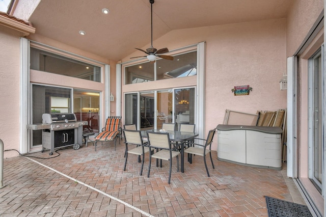 view of patio with area for grilling and ceiling fan