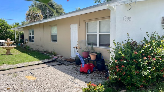 view of side of home featuring a yard