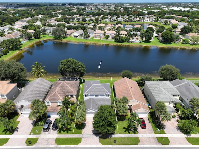 drone / aerial view with a water view