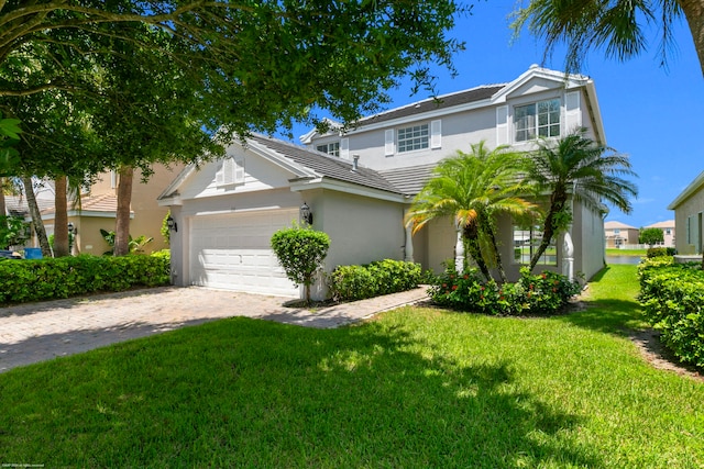 view of front of home with a front lawn