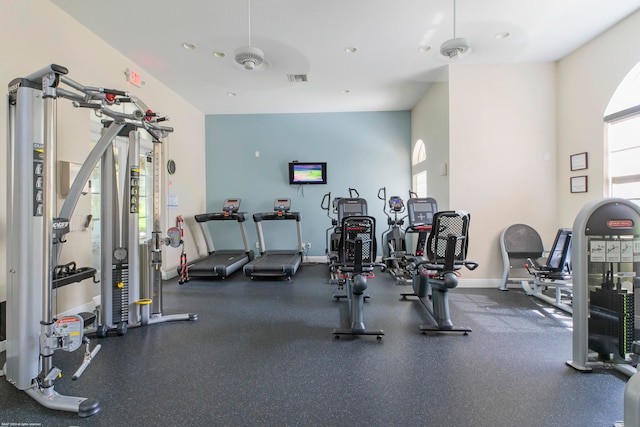 exercise room with ceiling fan