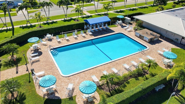 view of swimming pool with a patio area